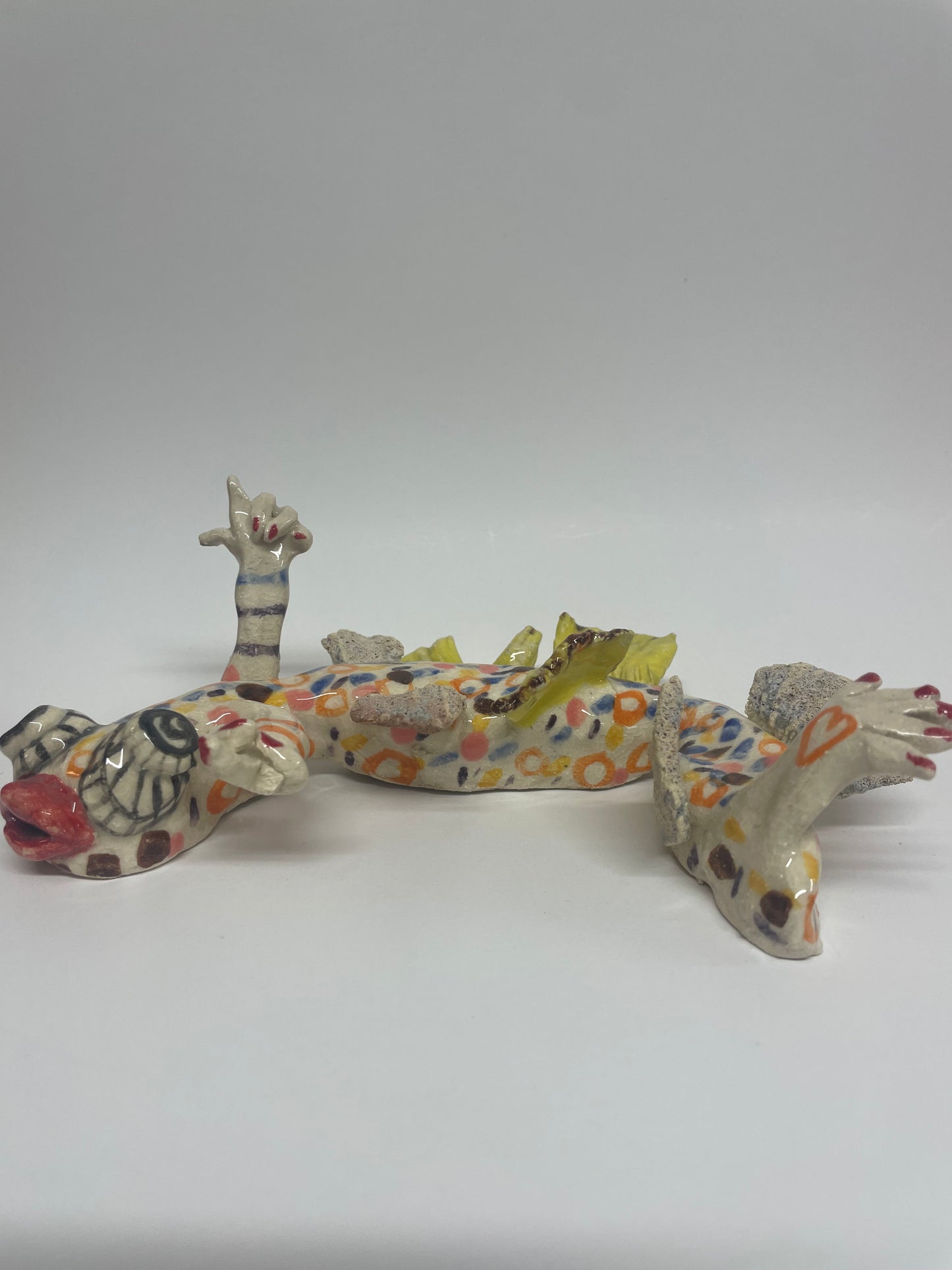 Vims keramik figur til at hænge på væggen (gul)