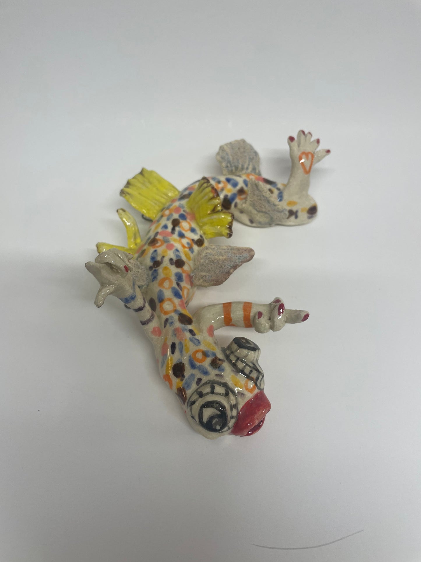 Vims keramik figur til at hænge på væggen (gul)