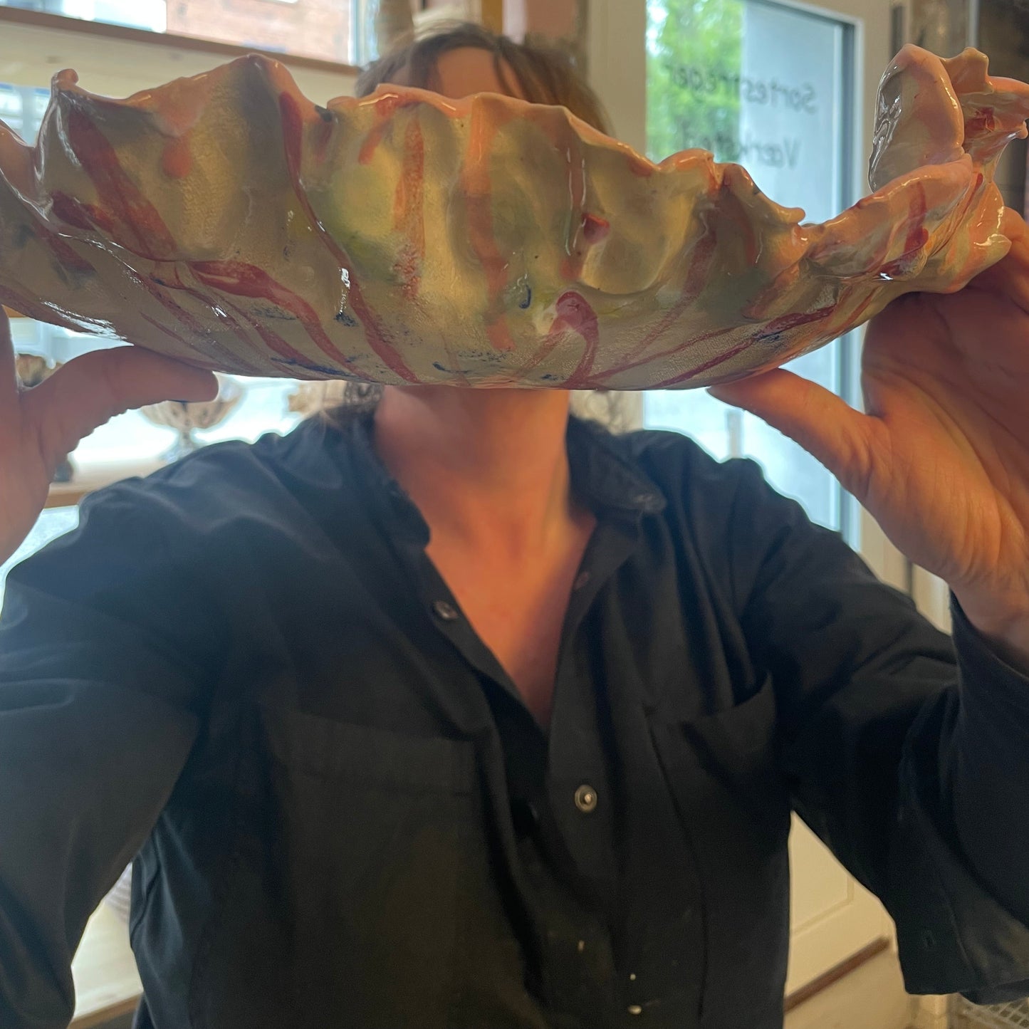 Stort fad med ansigt og fugle