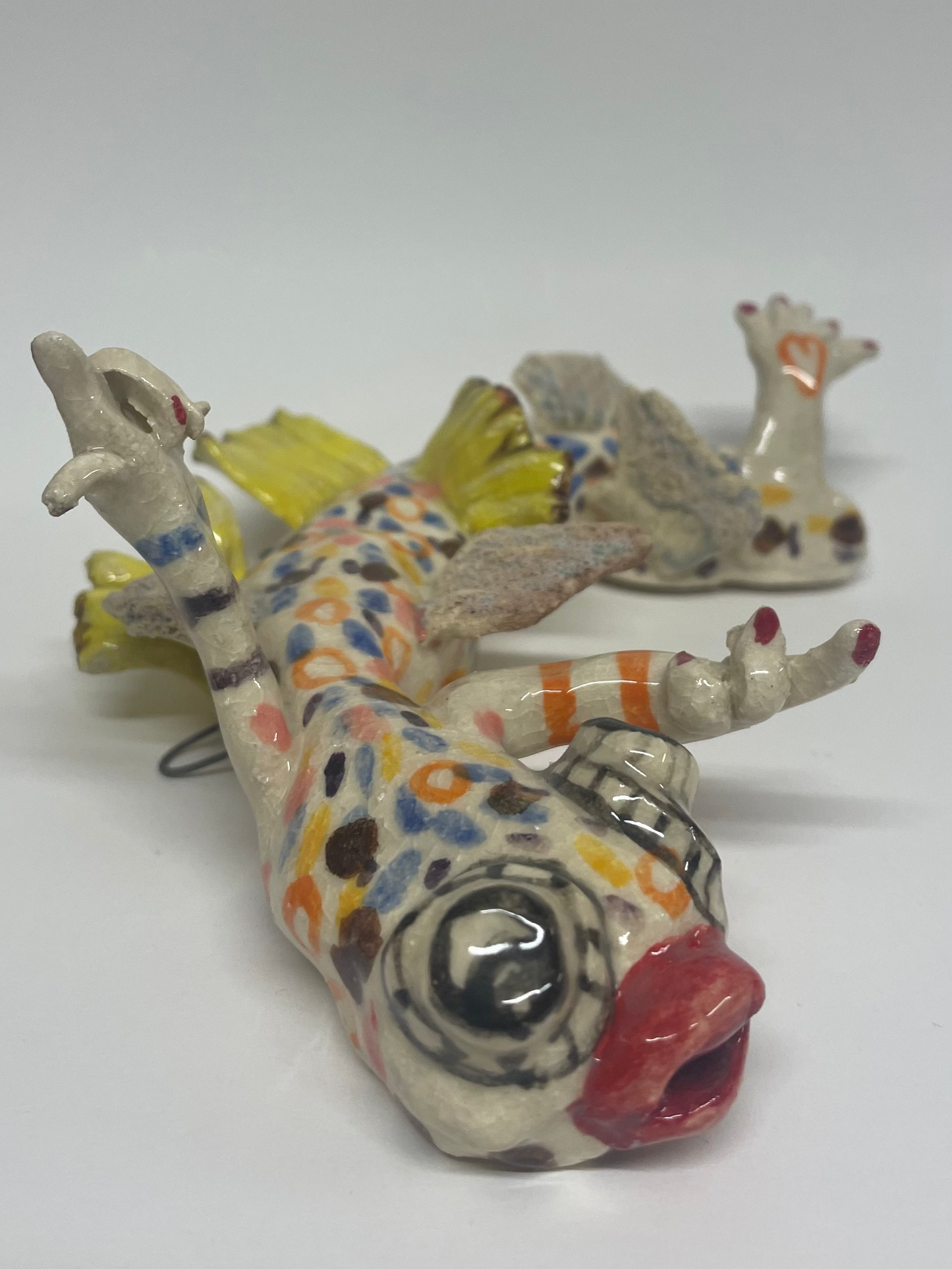 Vims keramik figur til at hænge på væggen (gul)